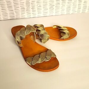 TWISTED TWO-STRAP SLIDERS GOLD